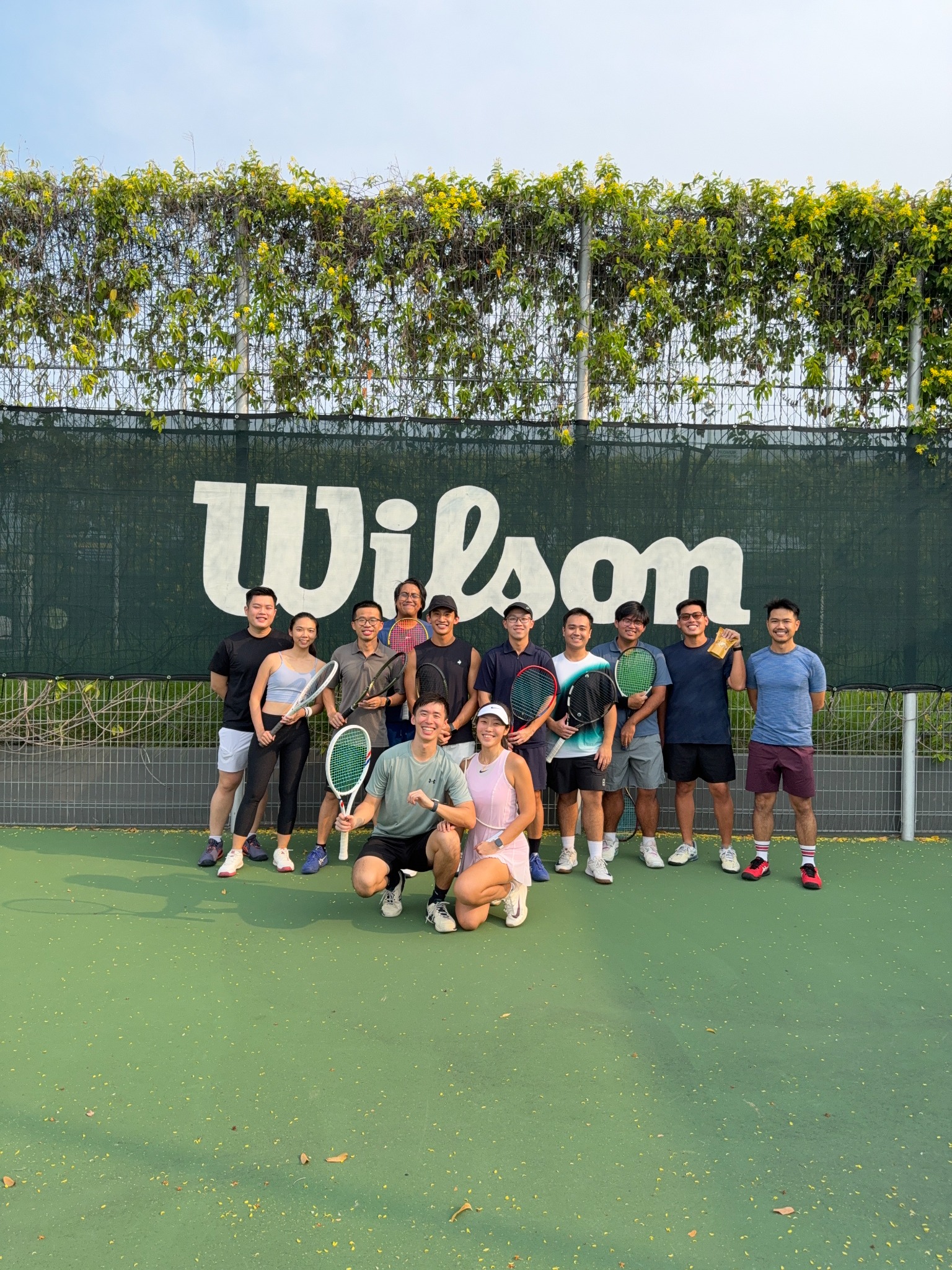 AdSide Club social doubles community holding their tennis rackets